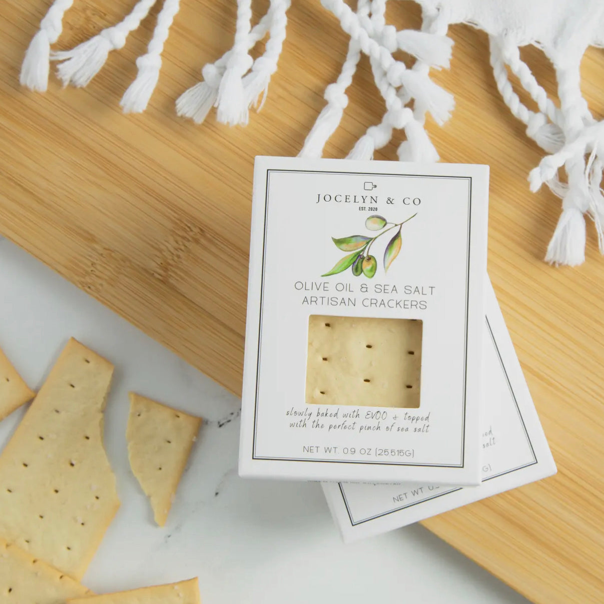 A package of Jocelyn & Co olive oil and sea salt artisan crackers.