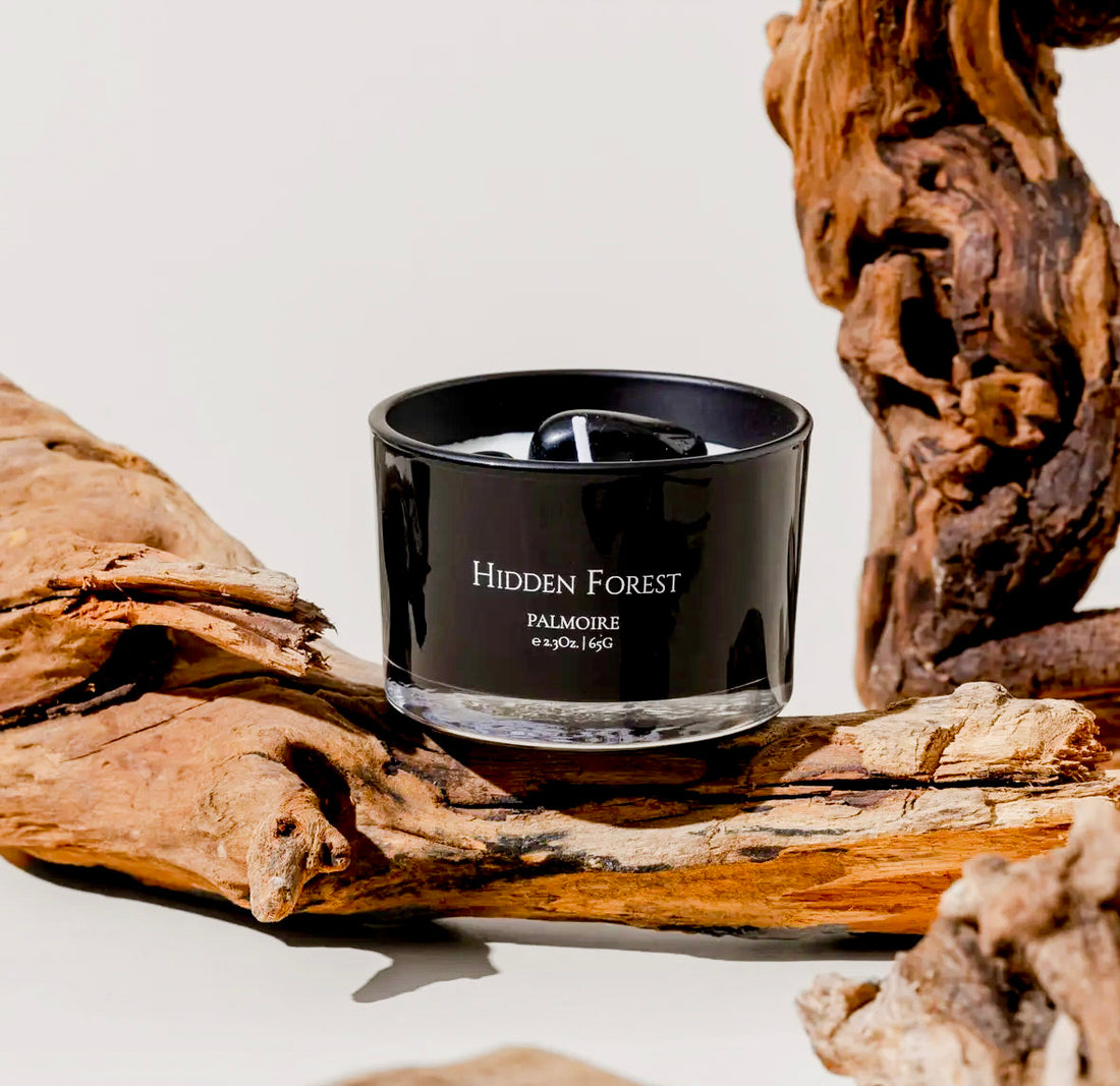 Hidden Forest candle with gemstones.